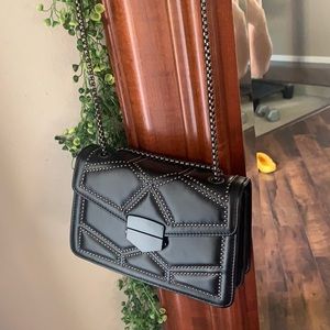 Black, studded, crossbody purse
